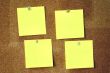 close-up of four blank paper sheets