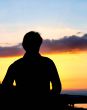 silhouette against summer sunset