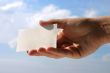 holding blank business card