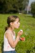 The girl and a soap bubble