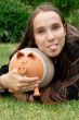 Girl with Piggy