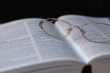 glasses on book page