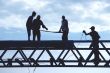 silhouette workers on construction site