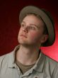 man in grey hat