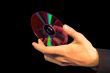 hand holding CD