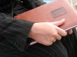 Girl`s hand with book