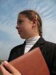 Young businessgirl with a book