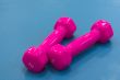 Pink dumbbells for fitness