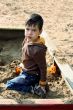 Boy in the sand-box