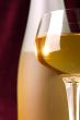 white wine in glass and bottle