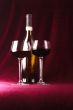 red wine in two glasses and bottle
