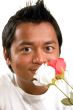 man holding a rose