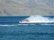 The men goes for a drive on a wave runner