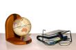 globe, notebook and glasses