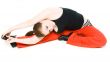 A young girl stretching