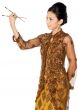 Beautiful asian girl playing with chopsticks