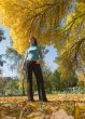 woman against autumn park