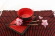 Chinese sticks, plate and cup