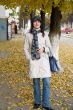 woman in autumn city street