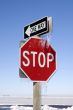 Stop and One Way Signs with Icicles