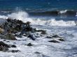 Wet stones in waves of the Black Sea