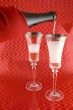 Champagne Pouring into Two Glasses