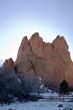 Sunrise Glow Behind Red Rock Formation