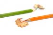 Orange and green pencils isolated on white