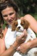 Woman with adorable cute puppy