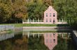 pink small house reflected in water