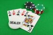 Full House with a dealer chip on top
