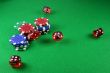 An Action shot of 5 dice thrown onto the table