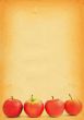 apples against old stained paper