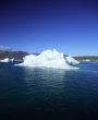 Iceberg against a blue sky