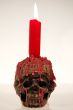 Skull with candle