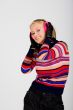 blond girl wearing ear muffs
