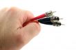 Fiber Optic Computer Cable held in the Hand
