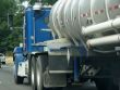 Blue semi truck with tanker