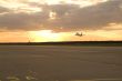 airplane setting of the sun
