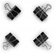 Four black metal clips