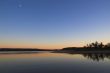 Sunset Moon over a Lake