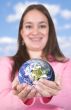 girl holding globe