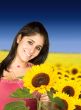 beautiful girl in sunflower field