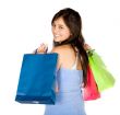 beautiful teenager with shopping bags