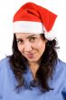 Female doctor with christmas hat