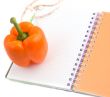Pepper and notebook