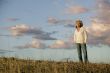 Western Woman Against a Cloudy Sky