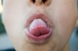 sticking out tongue