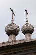 Two domes of ancient wooden church in north Russia