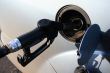 filling up auto tank at gas station